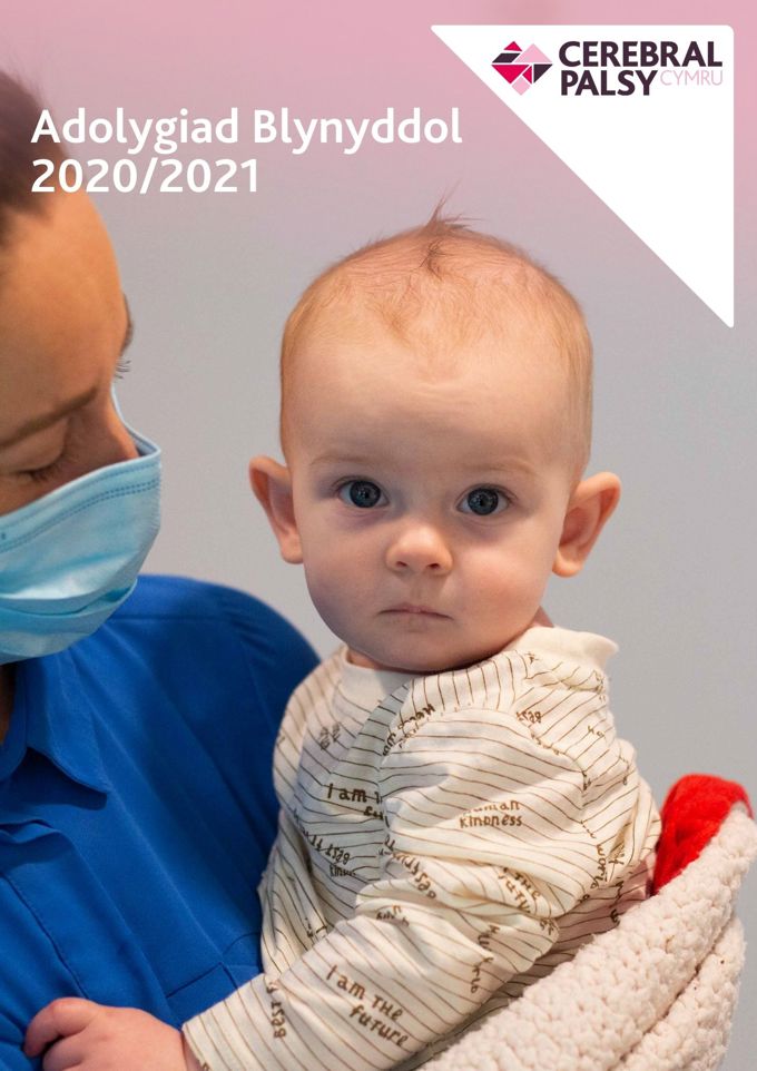 Screenshot of Welsh language annual review. Reads Andolygiad Blynyddol 2020/2021. Photograph shows baby boy looking directly at camera.